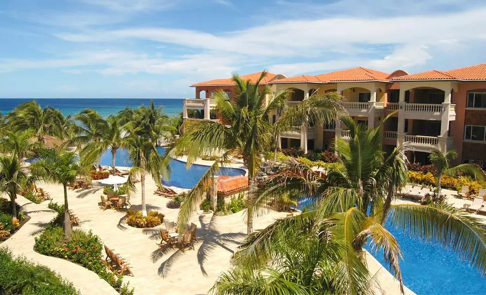 Four- or Seven-Night Stay with Round-Trip Boat Passes at Infinity Bay Spa & Beach Resort in Honduras - Primary Image