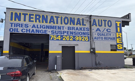 Conventional Oil Change + Oil Filter + FREE Tire Check, Air Fill, Fluid Top-Off, and FREE Full Vehicle Inspection - International Auto Services