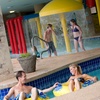 Image 12: Family fun awaits at Ocean Reef Resort—pools, slides & ocean views!