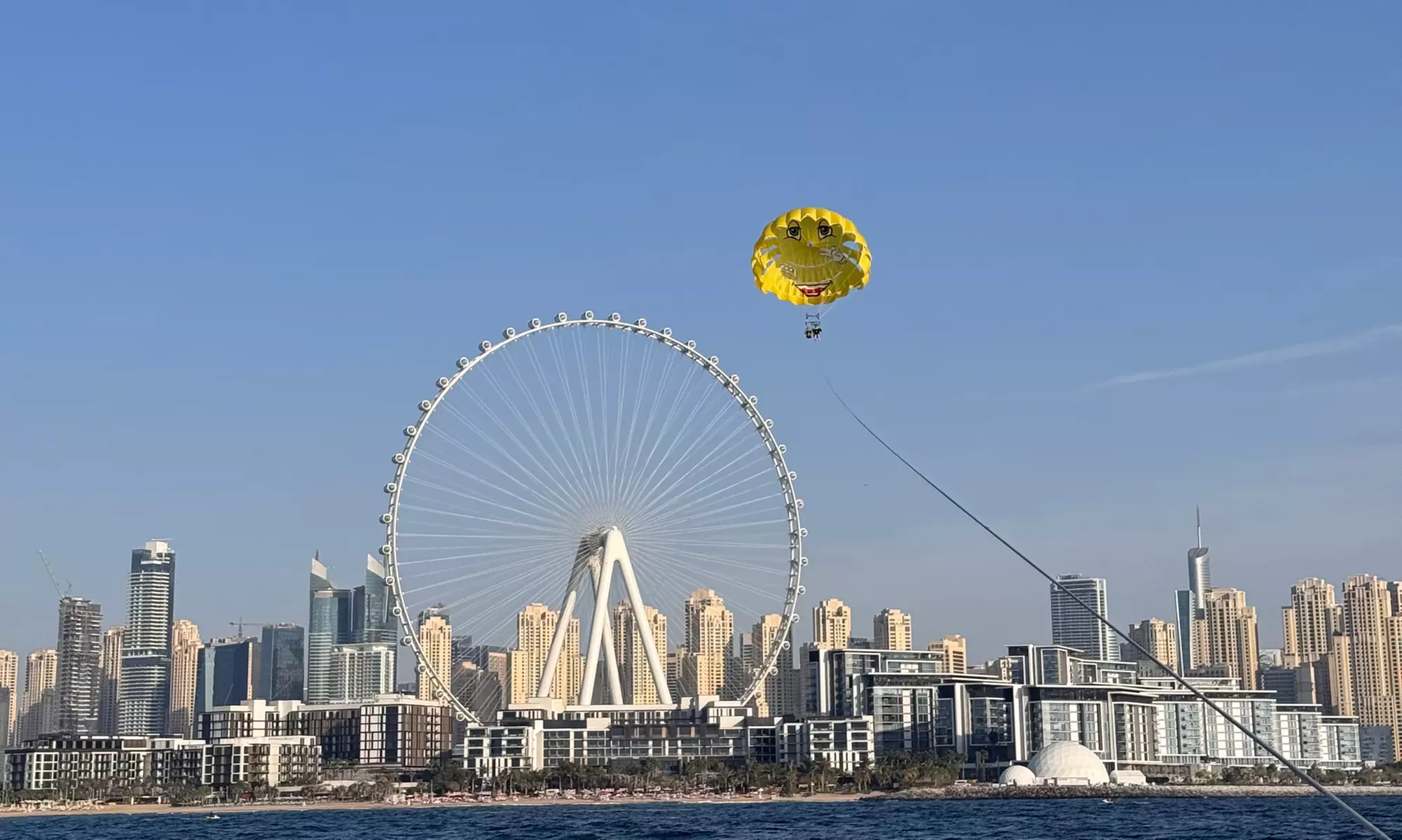Soar Above Dubai's Coastline with 30-Minute Parasailing for One or Two