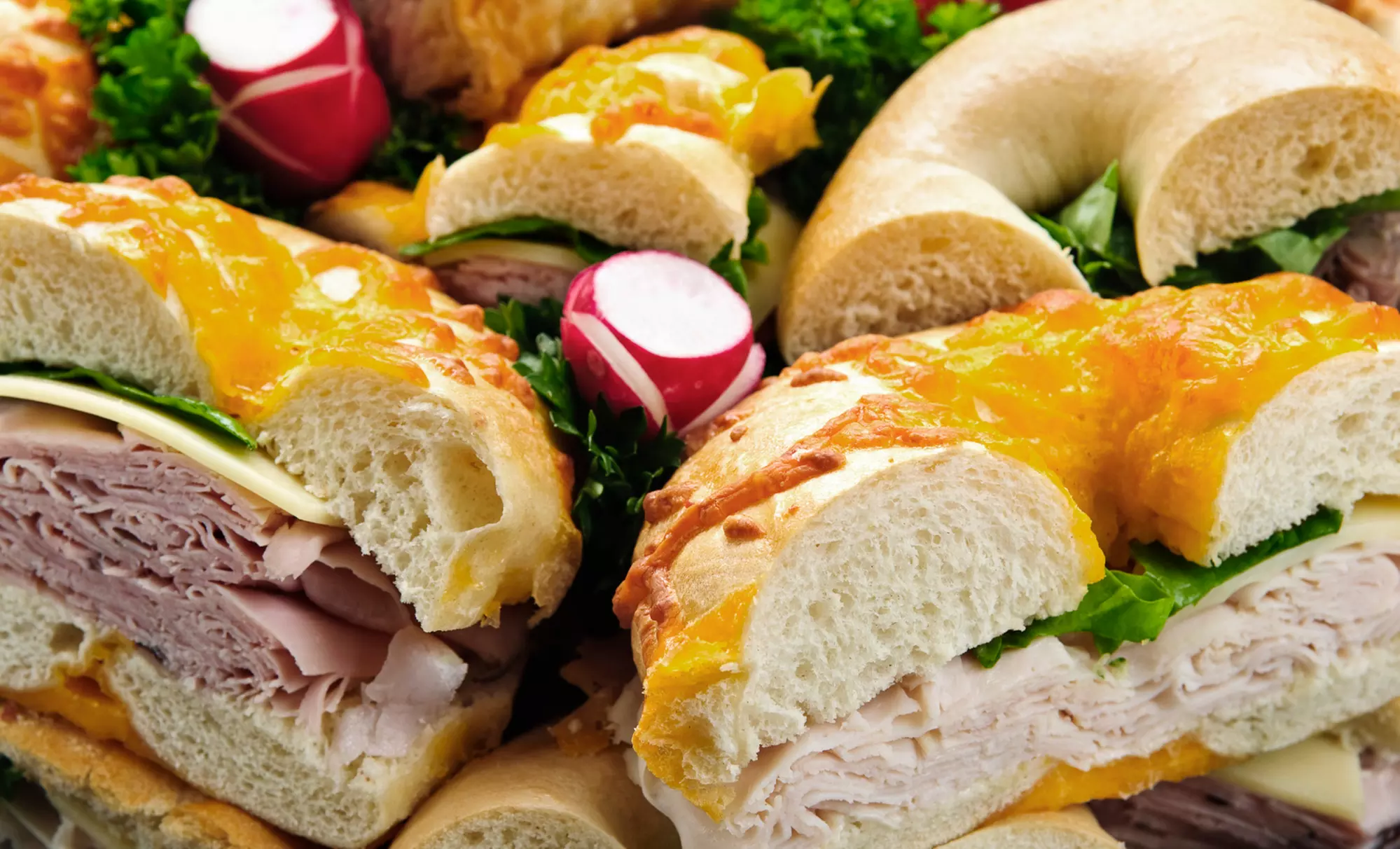 Baker's Dozen Bagels with Cream Cheese, or Sandwiches and Drinks at The Bagel Loft (Up to 51% Off) - Primary Image