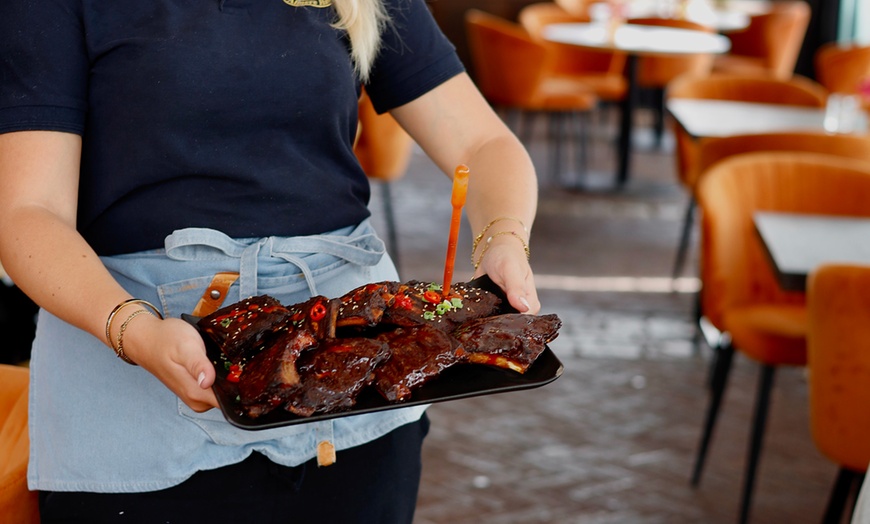 Image 7: Onbeperkt spare ribs eten met uitzicht op het Gooimeer