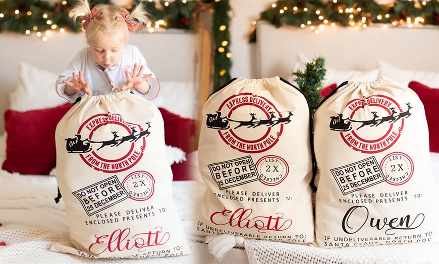 Image 10: Surprise loved ones with a festive, Personalized Santa Delivery Bag