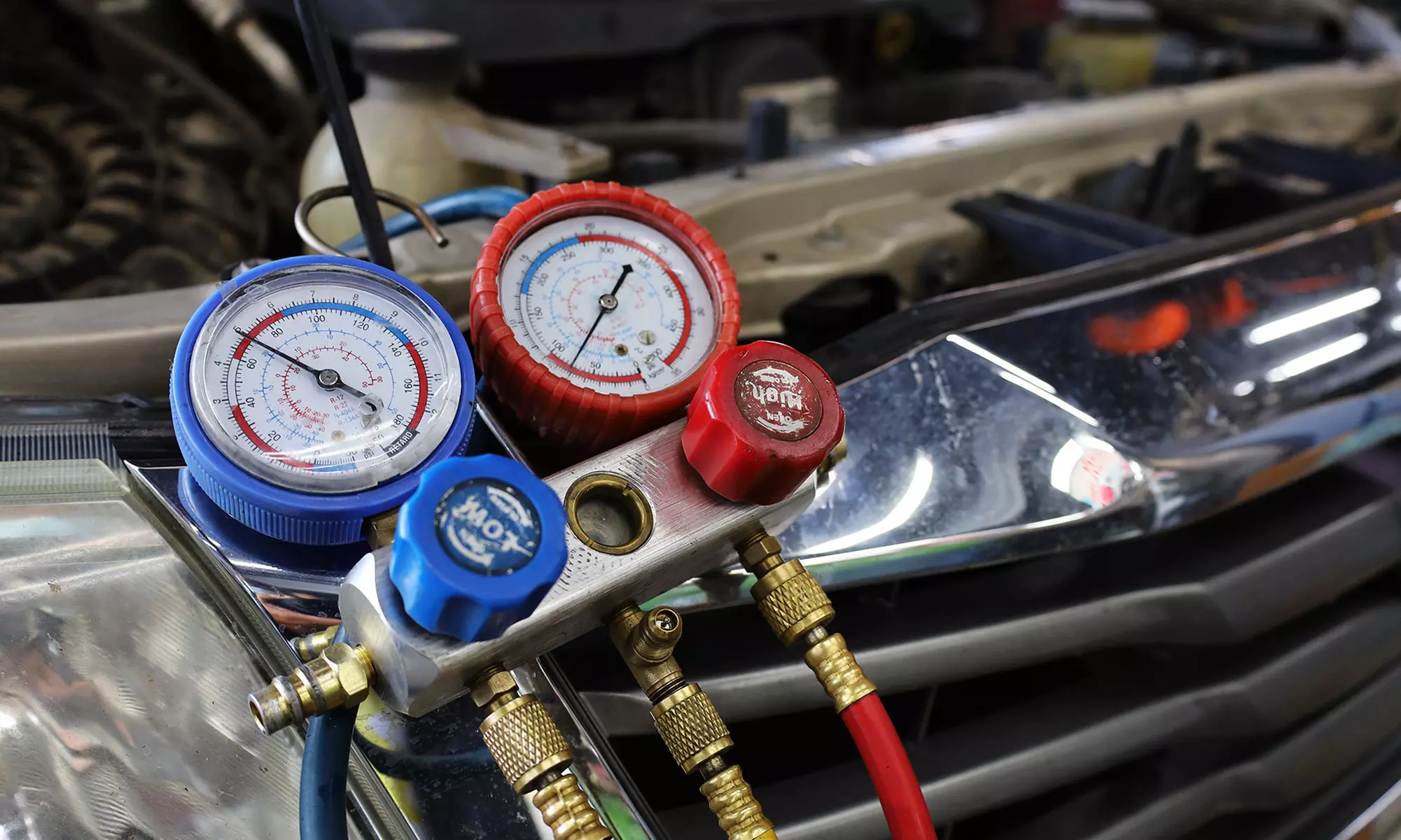 Brake, Coolant, Power Steering Flush or A/C Service (Leaks & Recharge)