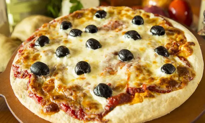 Large Thin-Crust Specialty Pizza with Salad at Big Tomato Pizza (Up to 37% Off). - Primary Image