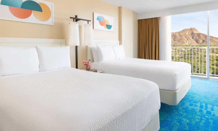 Image 28: Steps from Waikiki Beach and Free Surf-Board Credits Each Day