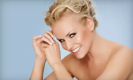 $30 for Two Airbrush Tans ($60 Value) or $49 for One Month of Unlimited Airbrush Tanning ($100 Value) at The Golden Gator  - Primary Image