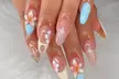 Get Stunning Nails with Classic, Gel or Regular Manicure + Optional Nail Design  (Up to 42% Off) - Second Medium