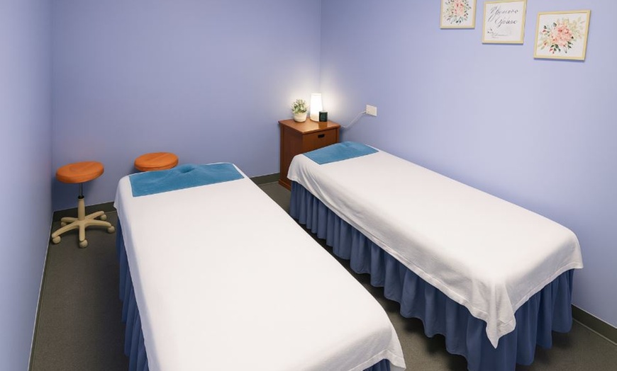 Image 1: Couples 60-Minute Swedish or Deep Tissue Massage with Hot-Stone & More