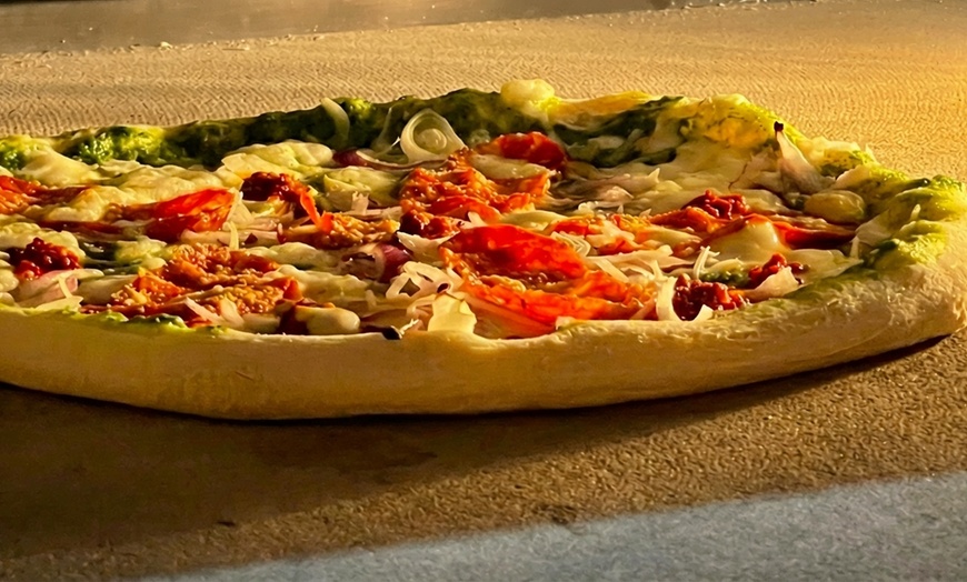 Image 5: Savor the flavors with 25% off on stone-baked pizzas