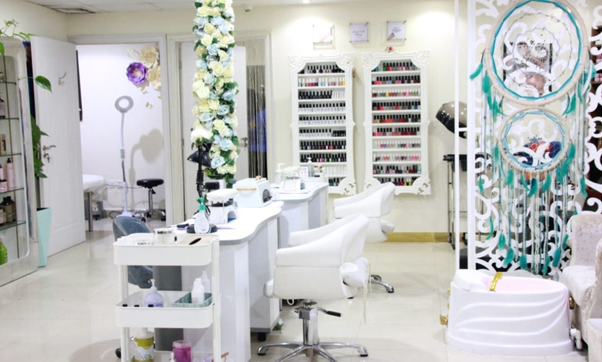 Image 7: Smooth & Silky: Full-Body Waxing and Threading Packages