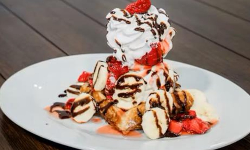 Image 14: $40, Signature Waffles, Entrees, Sides, or Drinks For Up to 4 People 
