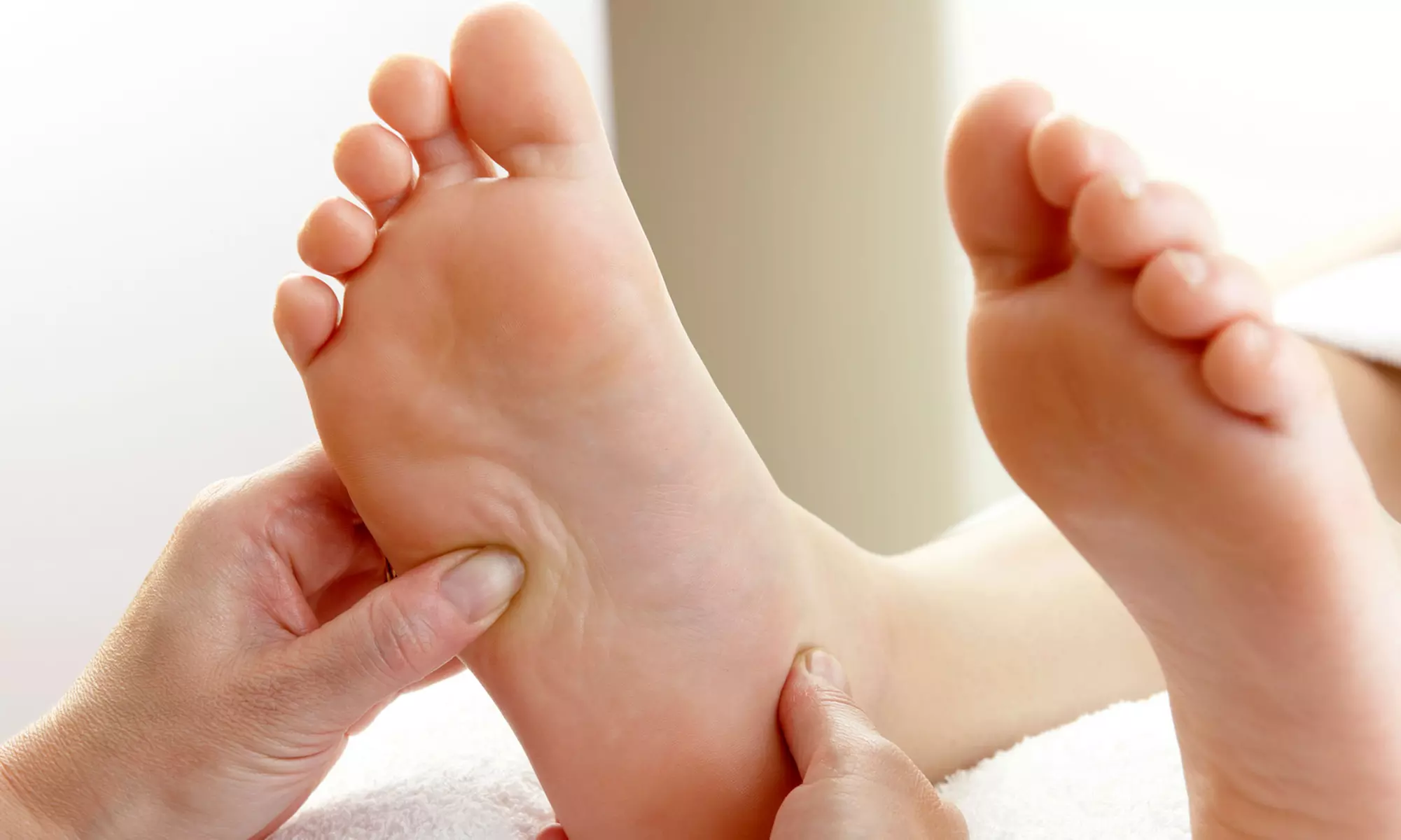 60-Minute Foot-Reflexology Session at Happy Foot Spa (50% Off). Four Locations Available. - Primary Image