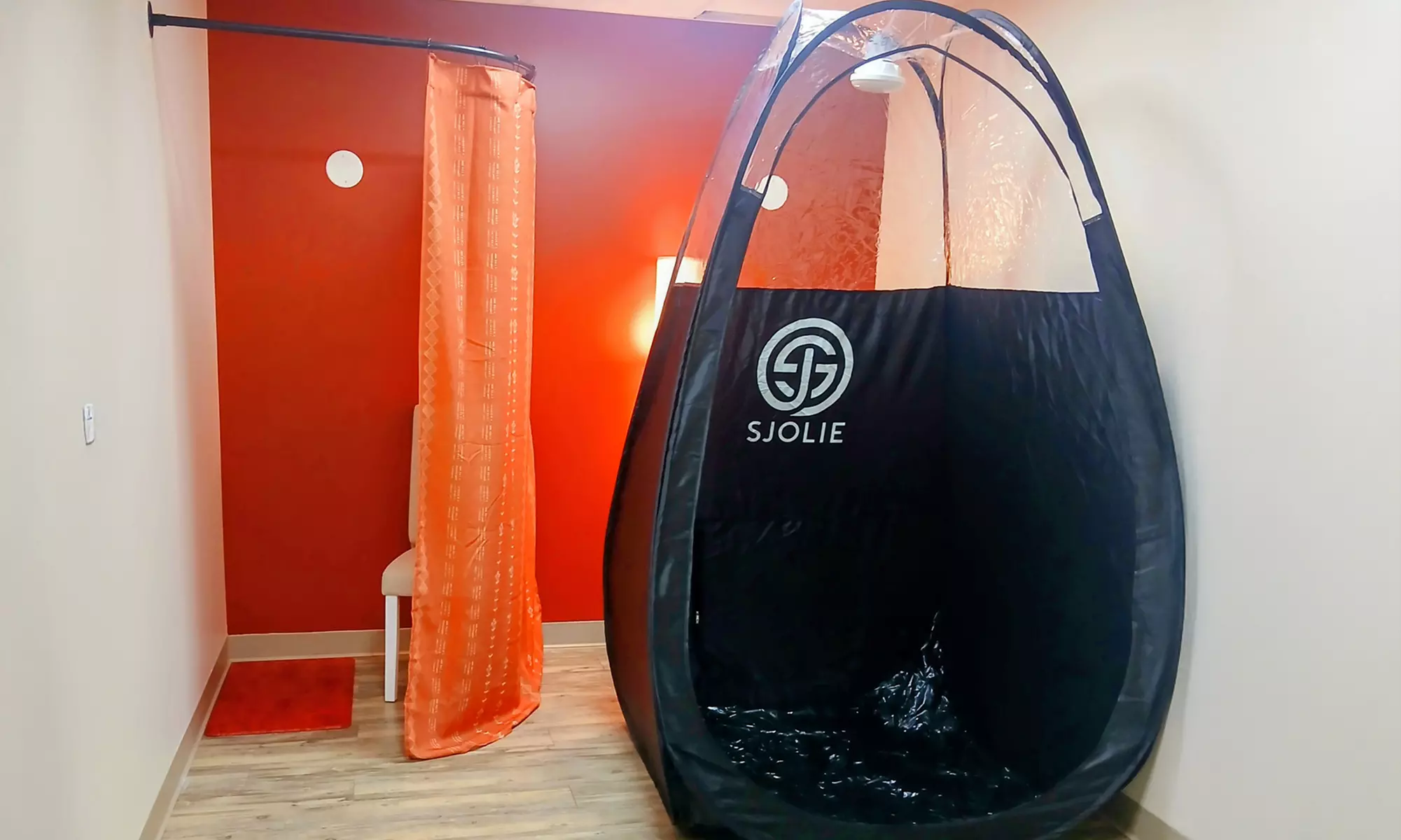 Enjoy a 1 or 3 Pack Organic Sjolie Spray Tan(s) or Brazilian Sugaring 