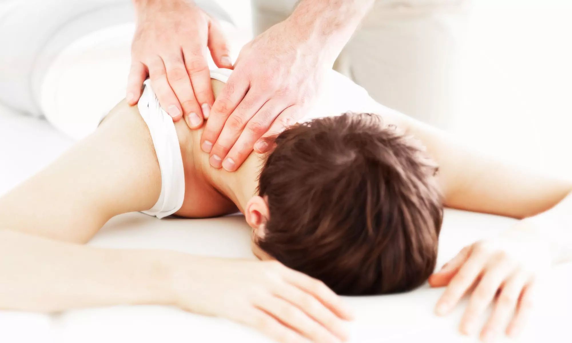 Spine Evaluation, Massage, and Two Adjustments at Shoreline Family Chiropractic and Wellness (Up to 84% Off) - Primary Image