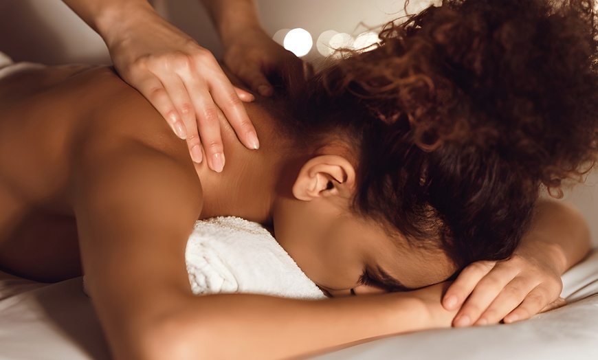 Image 1: One or Two 60- or 90-Minute Deep Tissue or Swedish Massages