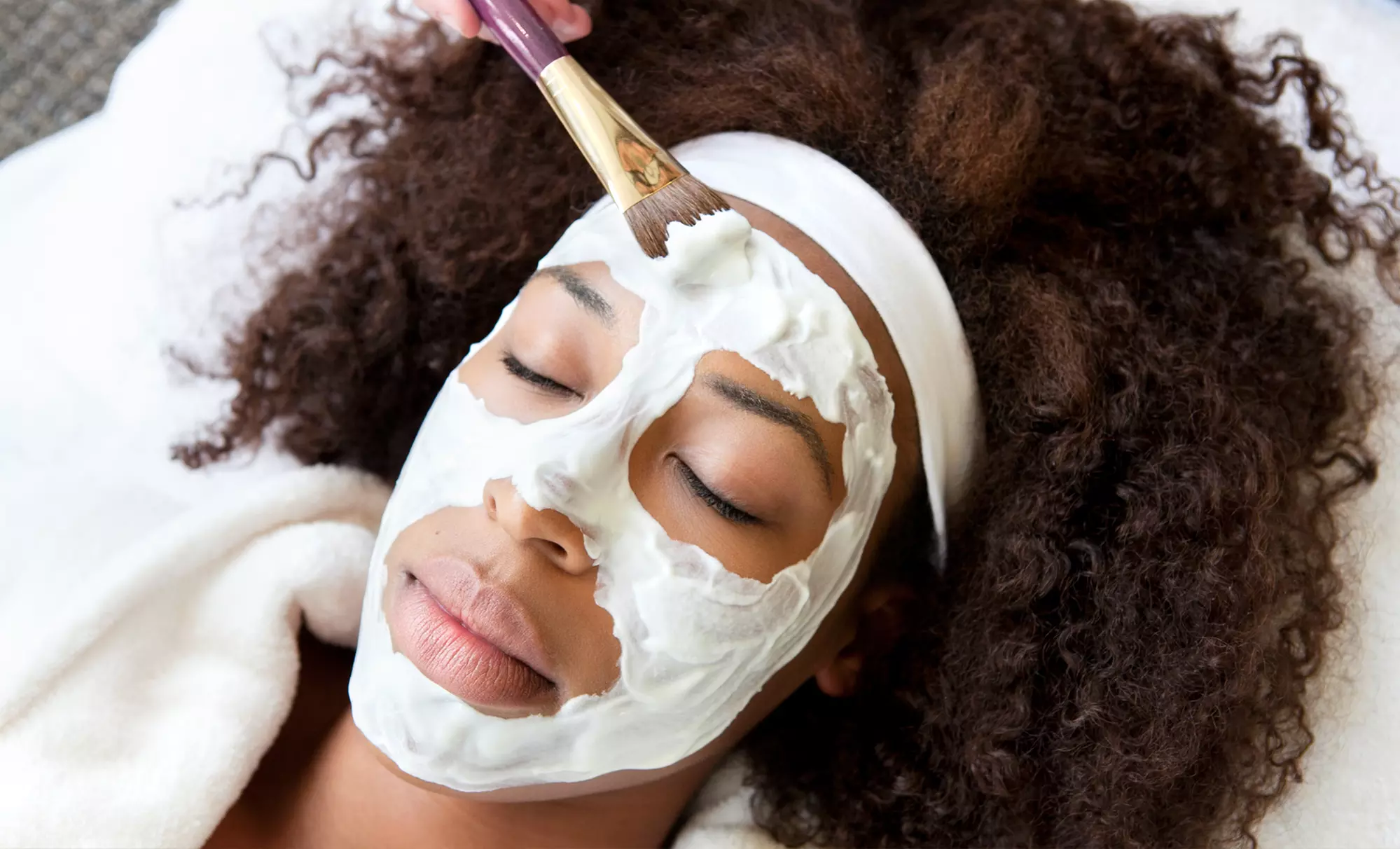 $99 for a Spa Day for Two with Facials, Mani-Pedis, and Refreshments at Lighten Up Day Spa ($220 Value) - Primary Image