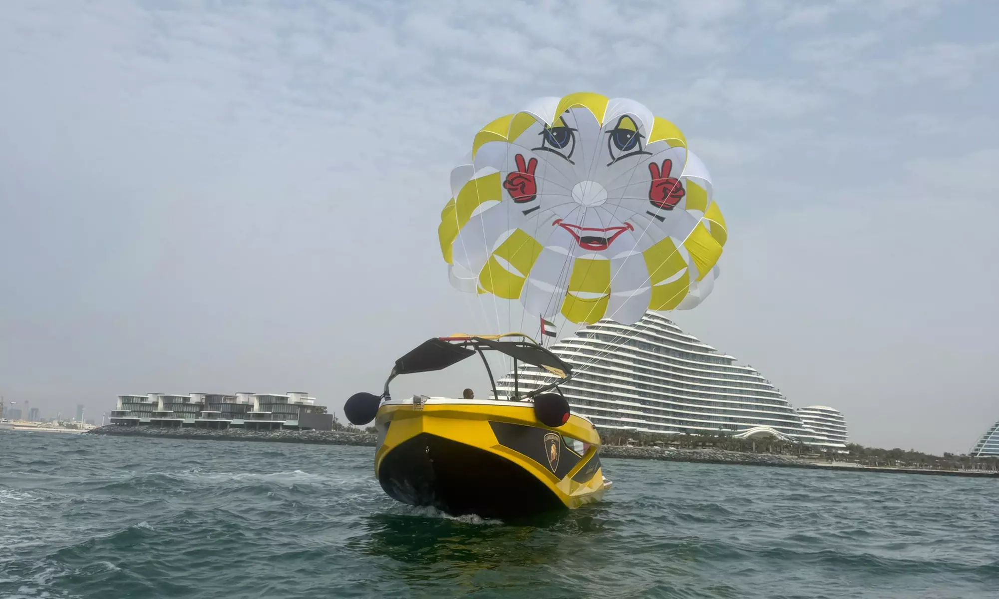 Soar Above Dubai's Coastline with 30-Minute Parasailing for One or Two
