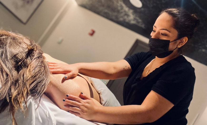 Image 1: Choice of 50-Minute Massage with Foot Therapy & 50-Minute Facial