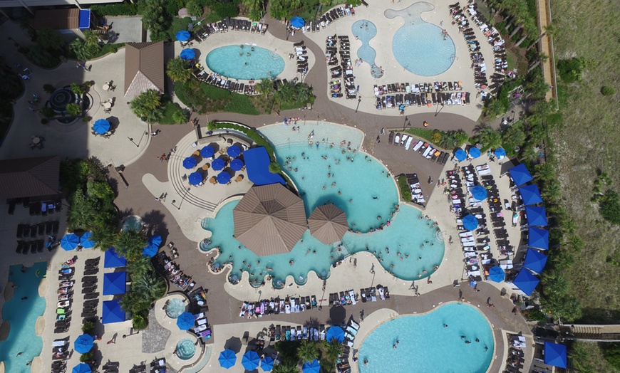 Image 50: Luxury Oceanfront Resort – Private Pools, Lazy River & Swim-Up Bar