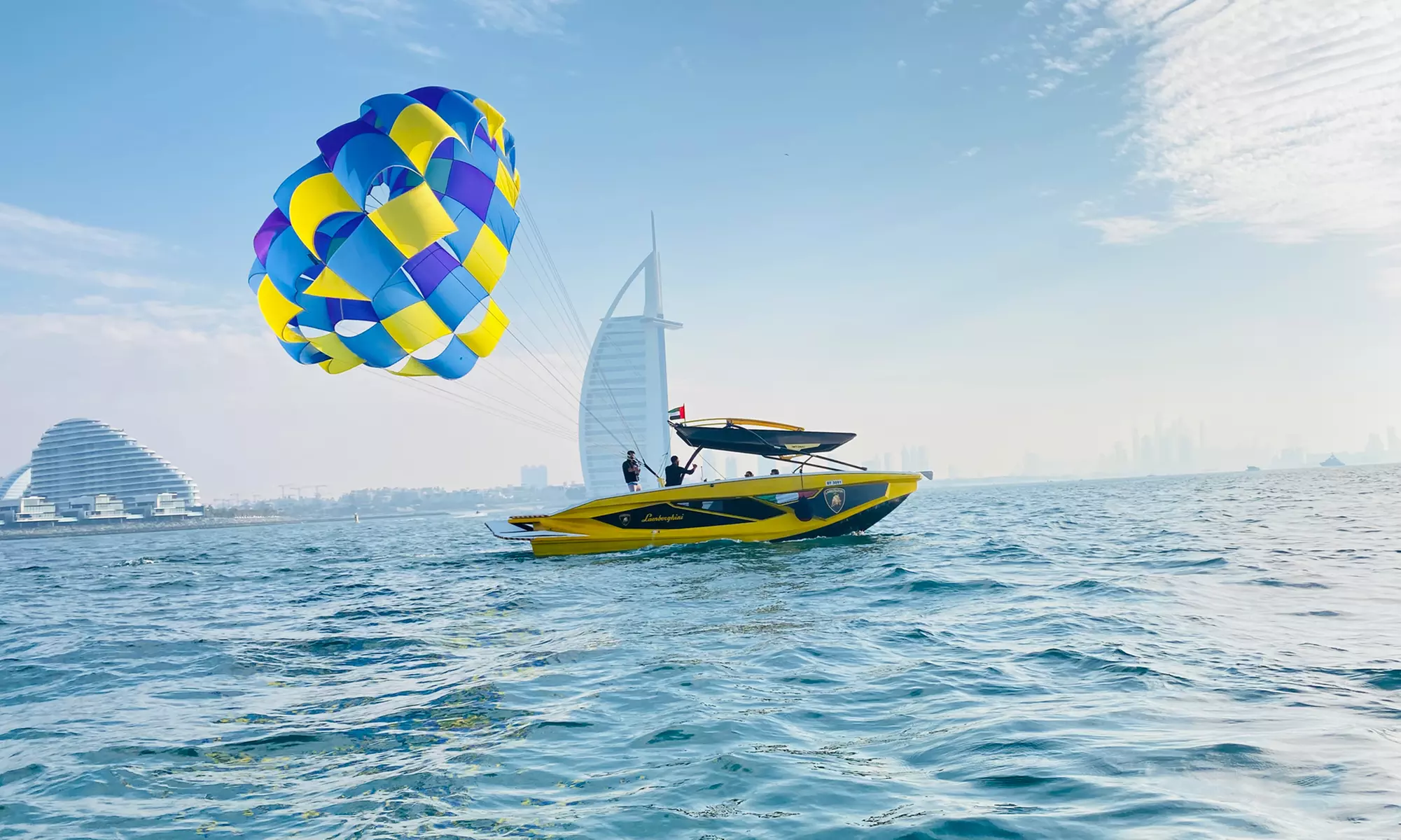 Soar Above Dubai's Coastline with 30-Minute Parasailing for One or Two