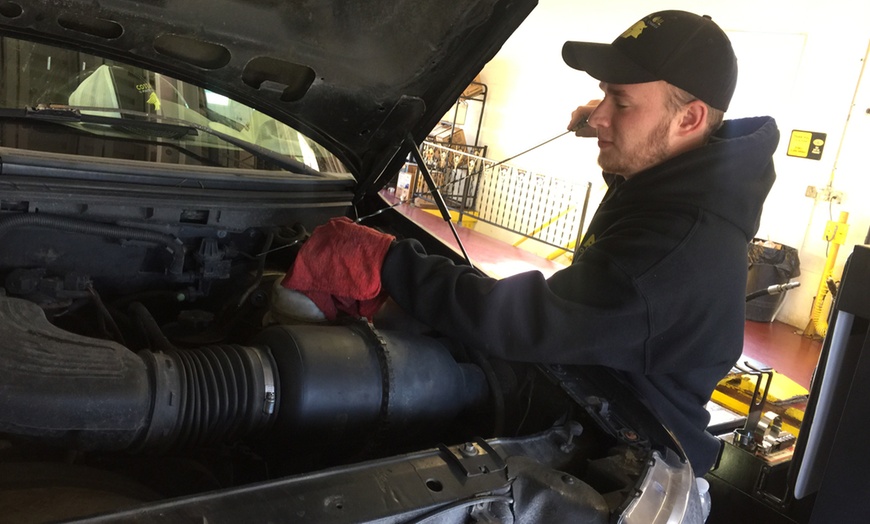 Image 2: 10-Minute Oil Change + Free Maintenance Check at Costa Oil

