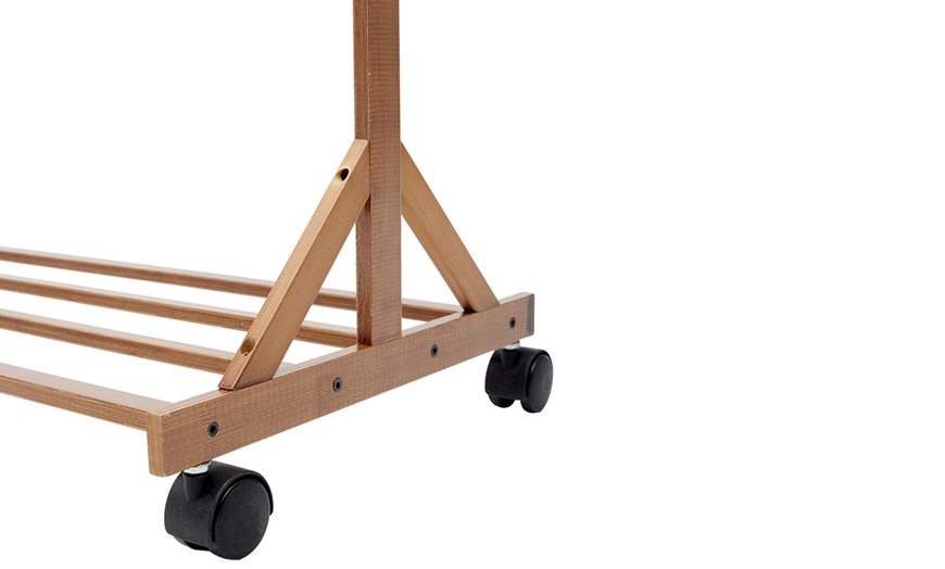 Image 5: Brown Bamboo Garment Rack with Wheels and  Bottom Shelf