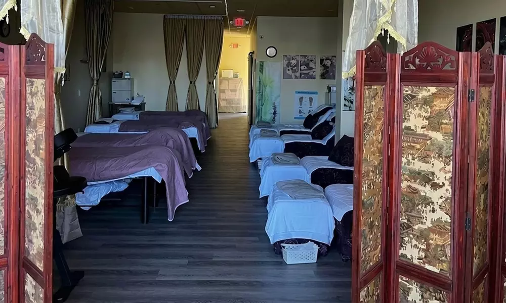 Relax with 60, 90, or 120 Min Massage with Hot Stone and Coconut Oil