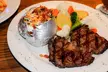 Savor Delicious Dishes with $40 or $80 Toward Food and Drinks at Silver Dollar Millcreek Casino (Up to 34% Off) - Second Medium