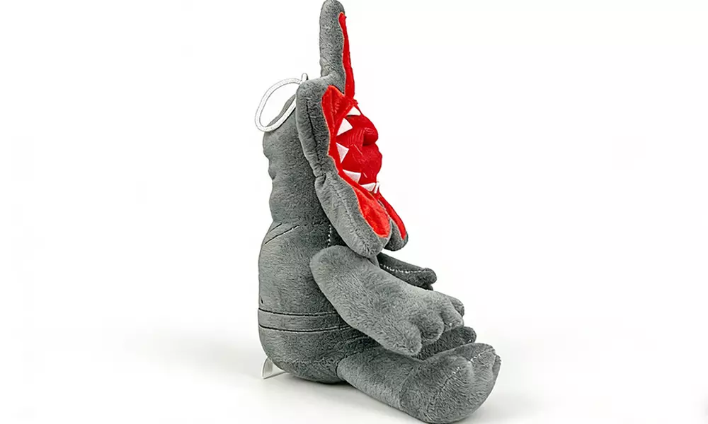 Monster-Plüschtier aus der beliebten Fantasy-Serie in Beige oder Grau - Second Medium