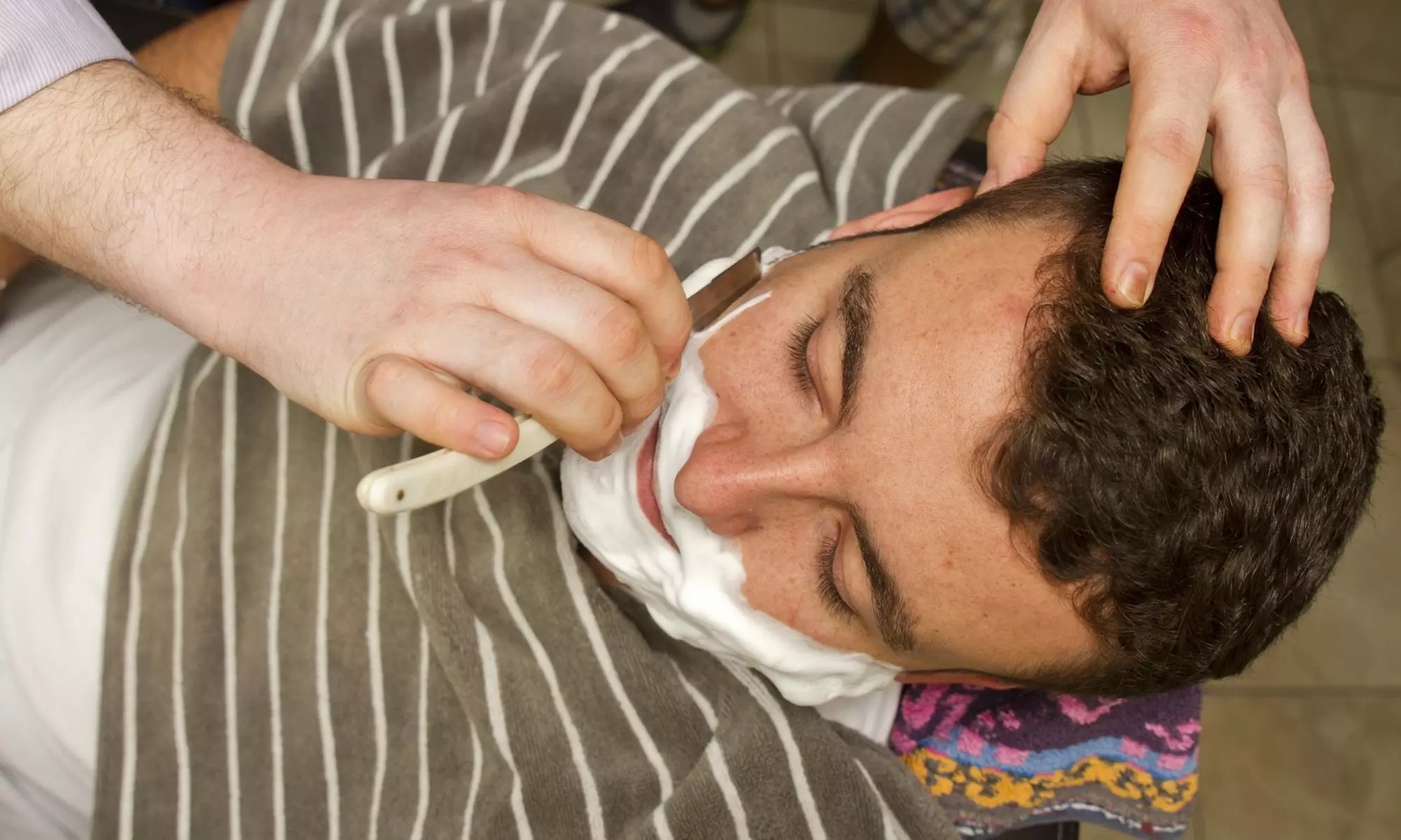 A Men's Haircut and Shave from Platinum Barber Shop & Shave Parlor (45% Off) - Primary Image