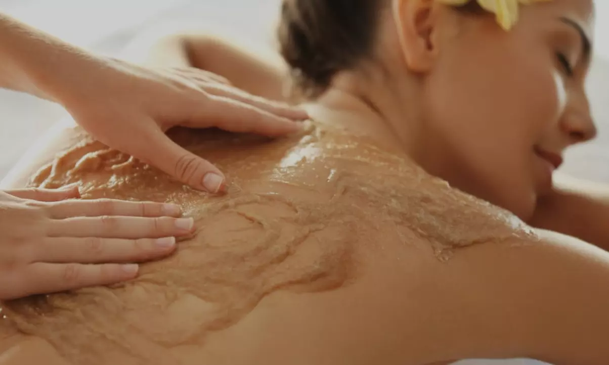 30-Minute Body Scrub w/ Optional Signature or Deluxe Hydrating Facial
