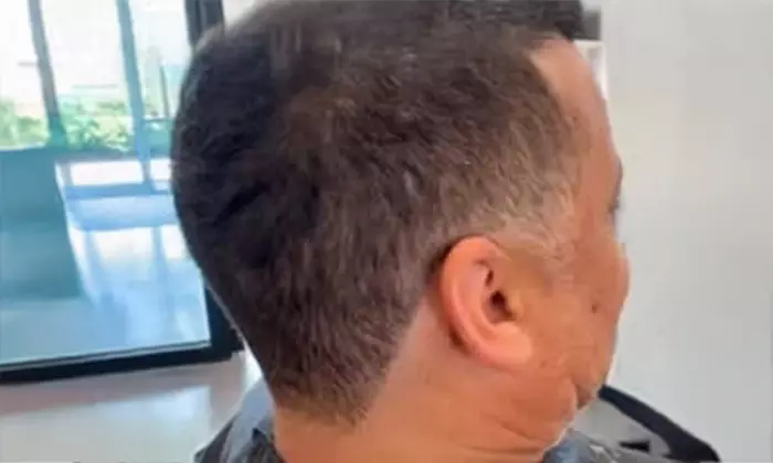 One or Two Sessions of  Men's Haircut with Optional Deep Conditioning 