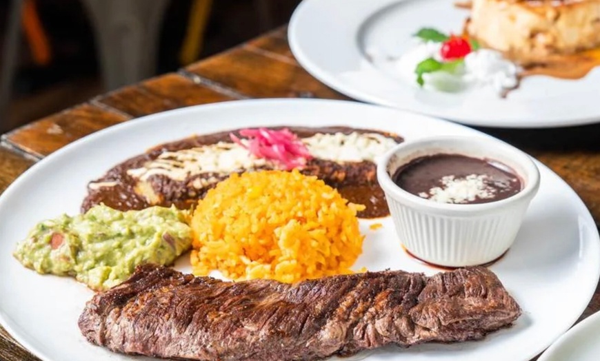 Image 13: Vibrant Rooftop Dining: Choose Meals, Margaritas, or Dining Credit