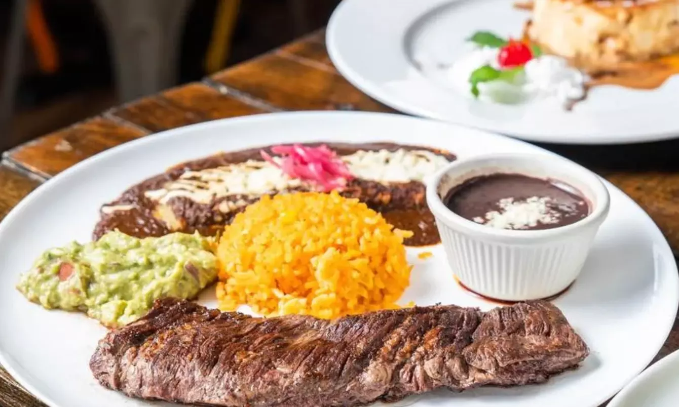 Vibrant Rooftop Dining: Choose Meals, Margaritas, or Dining Credit