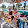 Image 2: Scenic Private Tiki Boat Cruise with Captain for Big or Small Groups