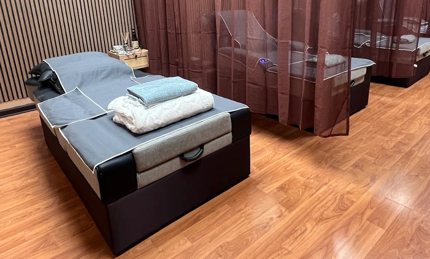 Image 2: Relax and Unwind with a 60-Minute Full Body or Therapeutic Massage