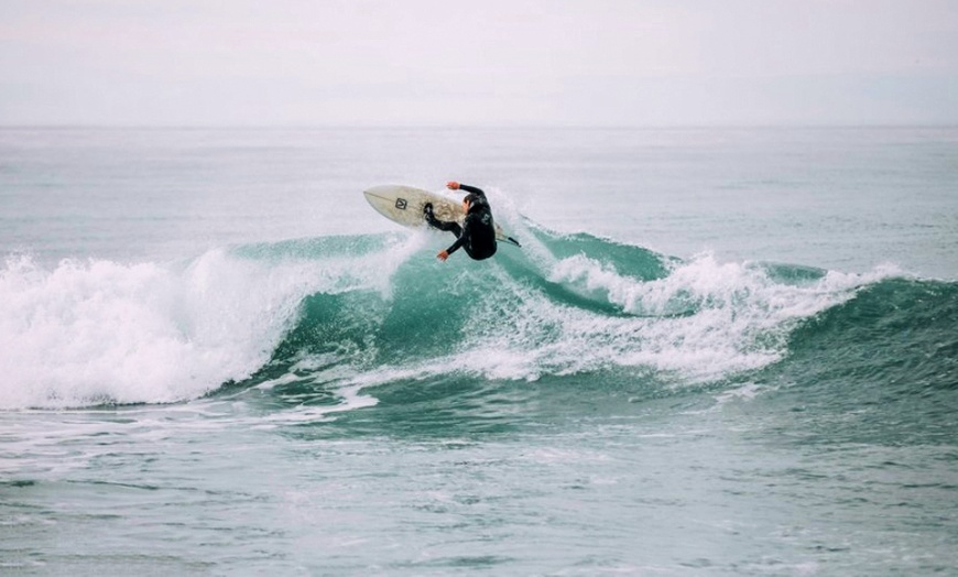 Image 1: Experience a Full Day Surf Equipment Rental for Three or Four 