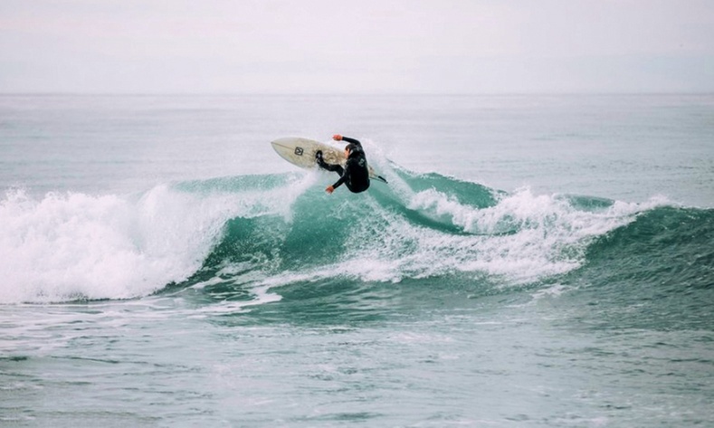 Experience a Full Day Surf Equipment Rental for Three or Four