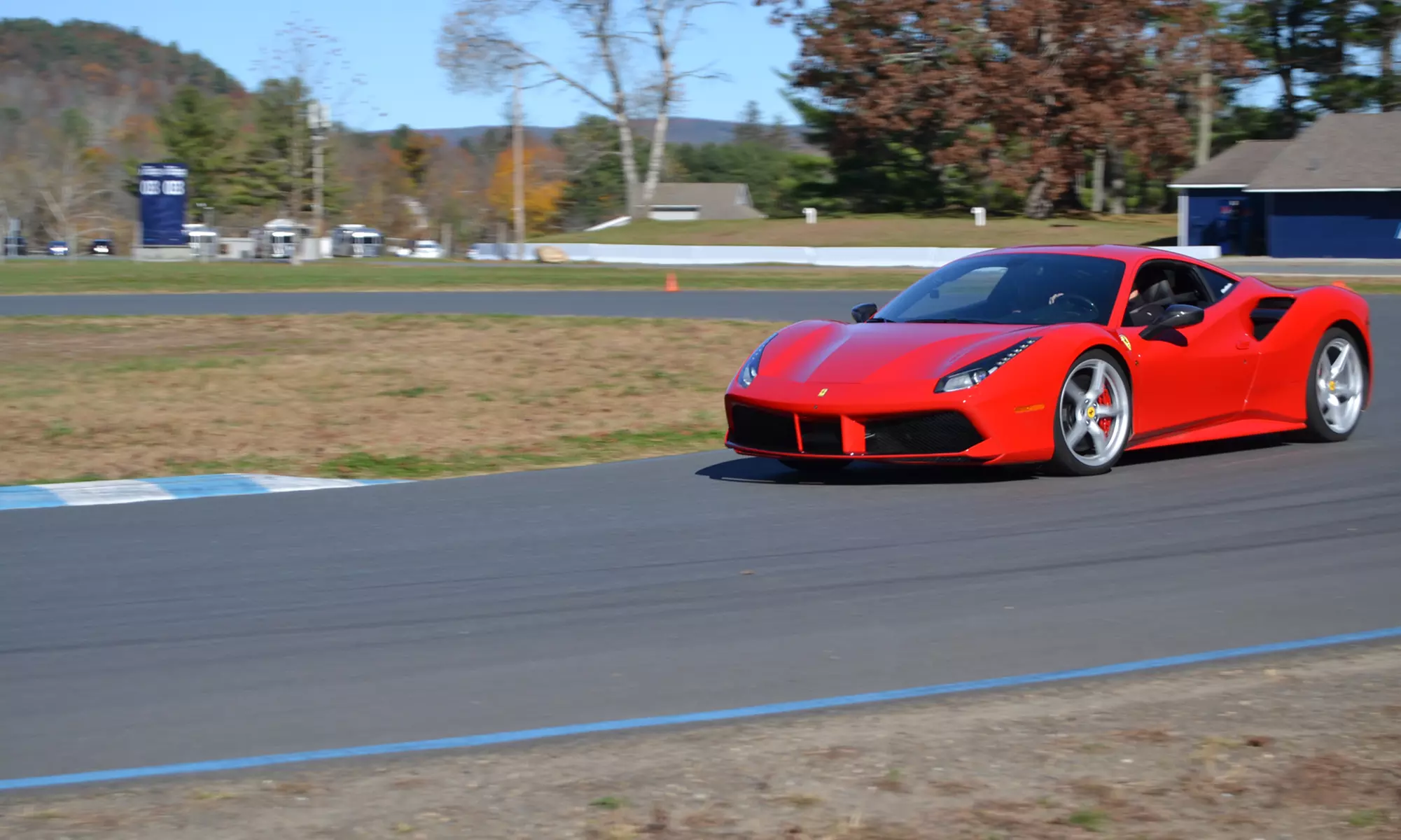 Enjoy a 3-Lap Premium Racetrack Driving or Ride Along for 1 or 2