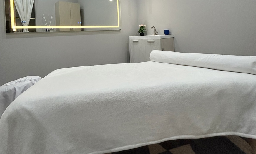 Image 1: Neck, Back with Aromatherapy, or Deep Tissue Massage with Hot Stones