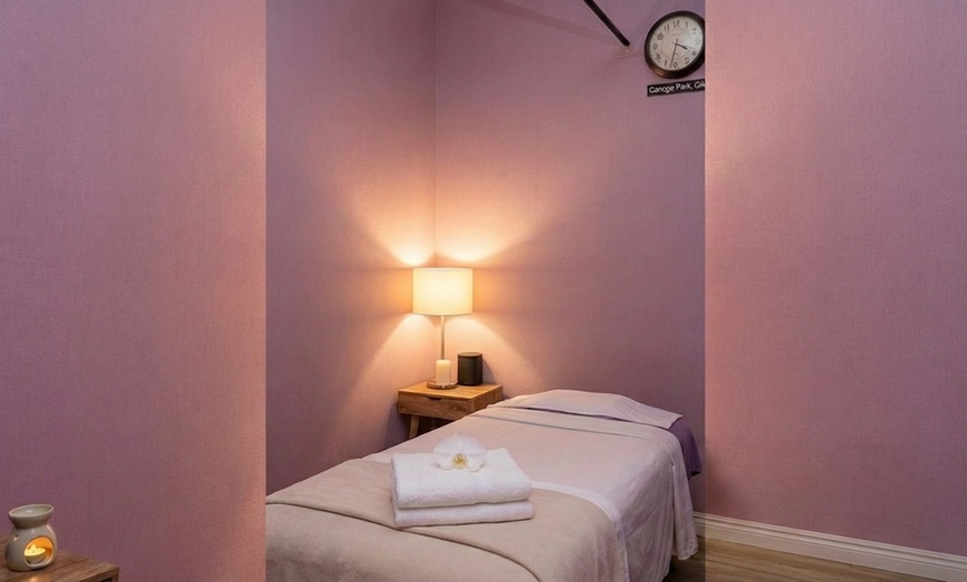 Image 4: 50/75-Min Thai, Swedish, or Deep Tissue Massage w/ Cupping or Reiki
