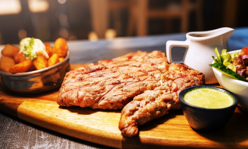 Image 2: Share a 20oz Sirloin, Raise a Glass, Make It a Night 