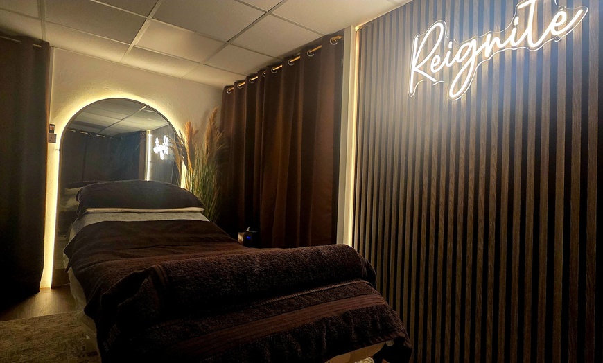 Image 1: Relax & Recharge: 60 or 75-Minute Full-Body Massage at Reignite