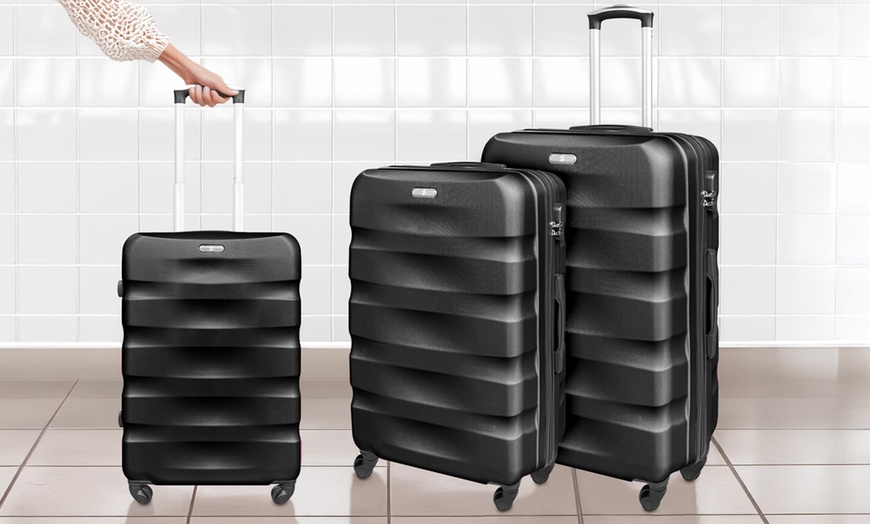 Image 15: Set da 3 valigie da viaggio in abs