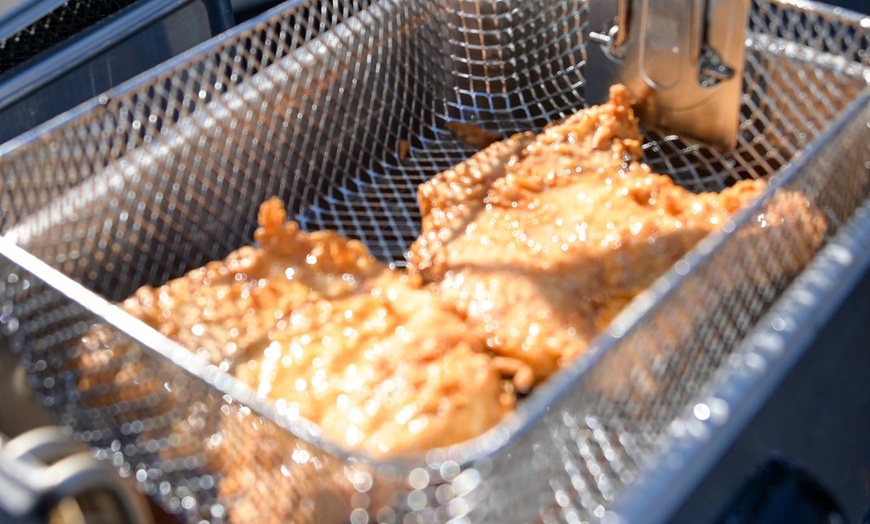 Image 3: Indulge in a Flavorful Turkey Wing Special or Food and Drink