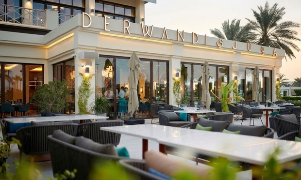 A lavish spread of traditional Lebanese Iftar and Suhoor dishes, featuring various mezze, grills, and desserts, set on a decorated table.