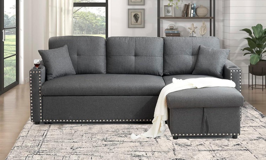 Image 2: Three Seater Reversible Sofa Bed with Storage and Cupholder