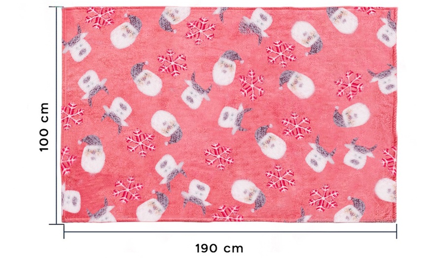 Image 3: Manta plaid infantil roja de forro polar con estrellas fluorescentes