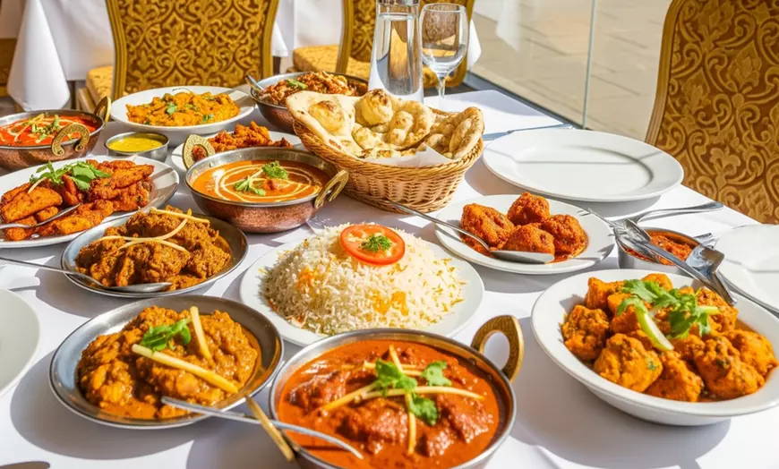 Image 1: Up to 55% Off on Indian Cuisine at Indos
